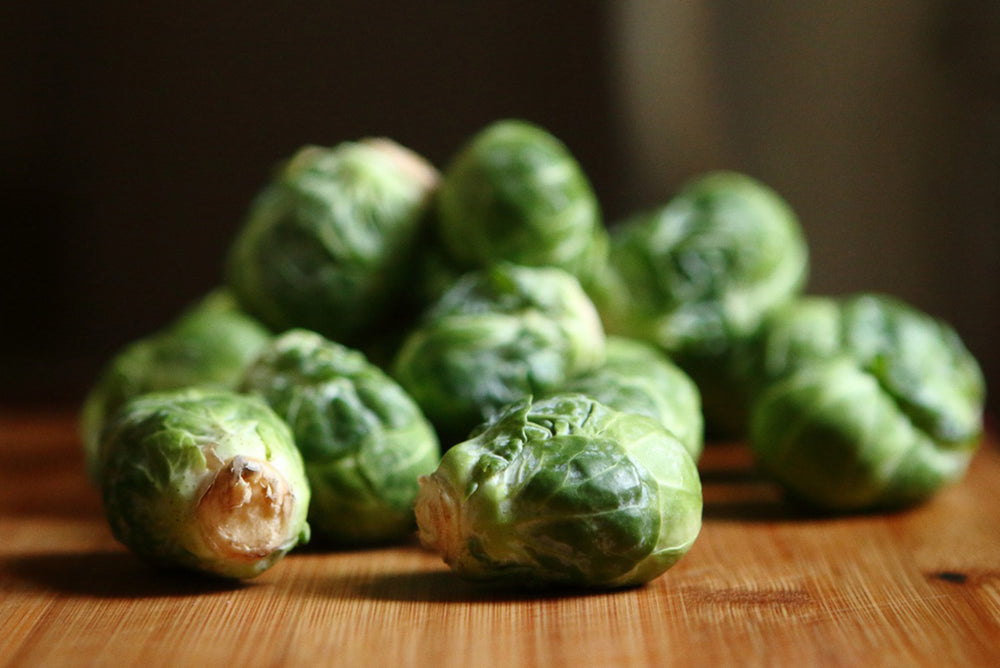 Brussels Sprout Slaw with Grainy Mustard Vinaigrette and Maple Pecans